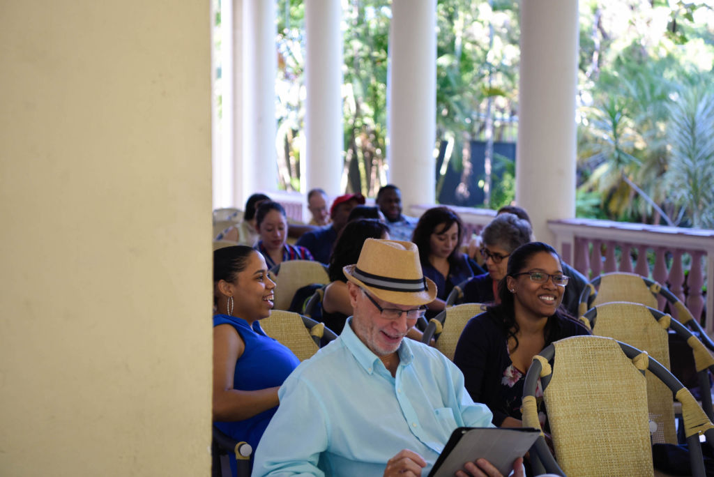 Victor Goode and others sitting at an event in Havana Cuba on the Cuba Comparative Law Program 2019